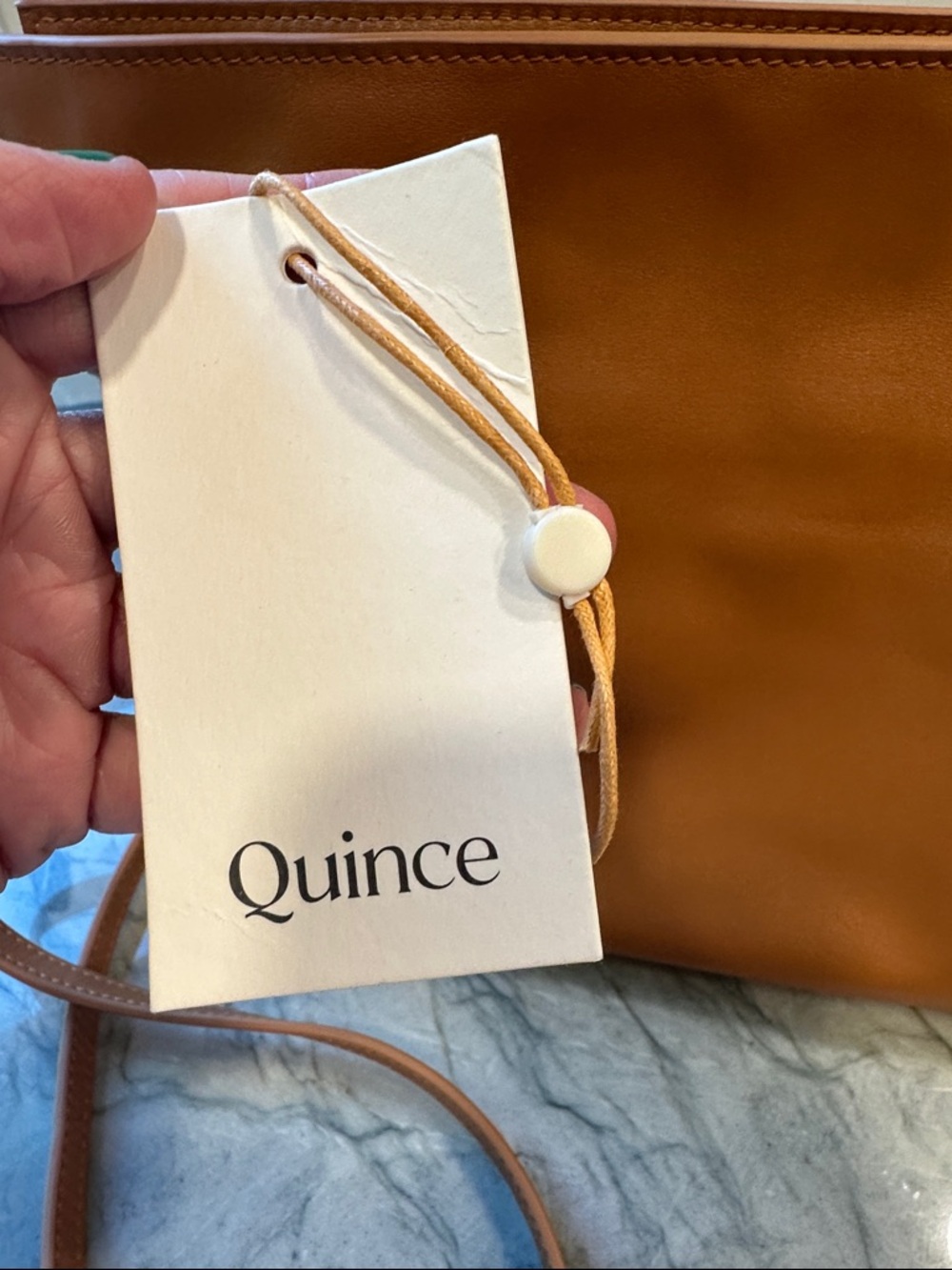 Quince Italian Leather Drawstring Pouch Crossbody Bag in Cognac - Picture 3 of 16